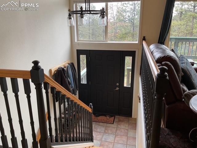 Image 16 of 39: View of entrance foyer looking down from main level