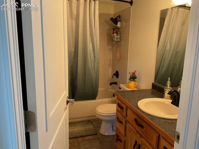 Image 34 of 39: 3rd bath on lower level Full bath with vanity, shower / bathtub combination