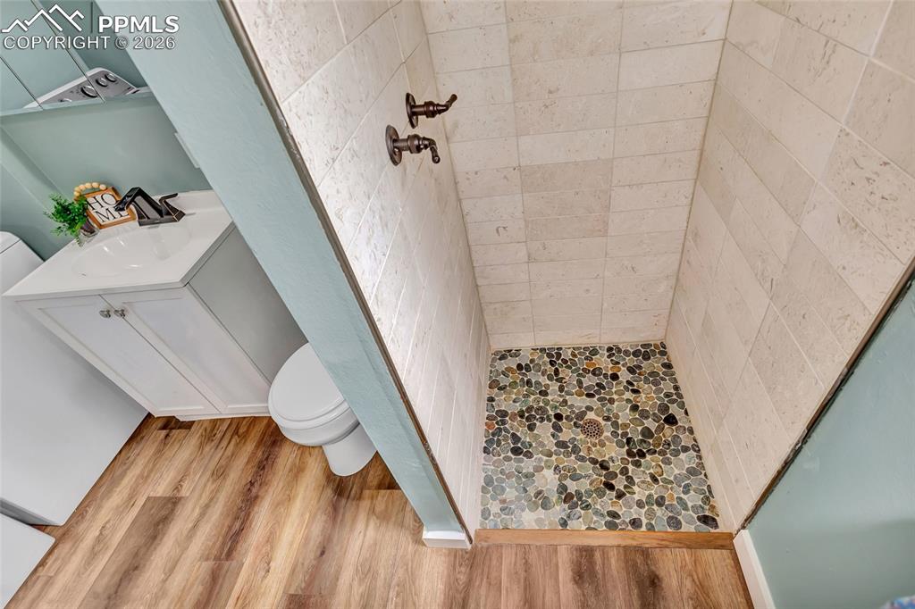 Image 14 of 31: 3/4 Bath attached to Primary bedroom, LVP flooring