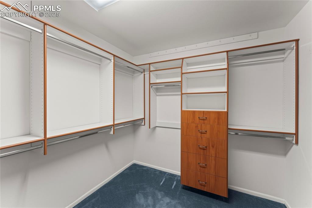 Image 39 of 49: Walk in closet