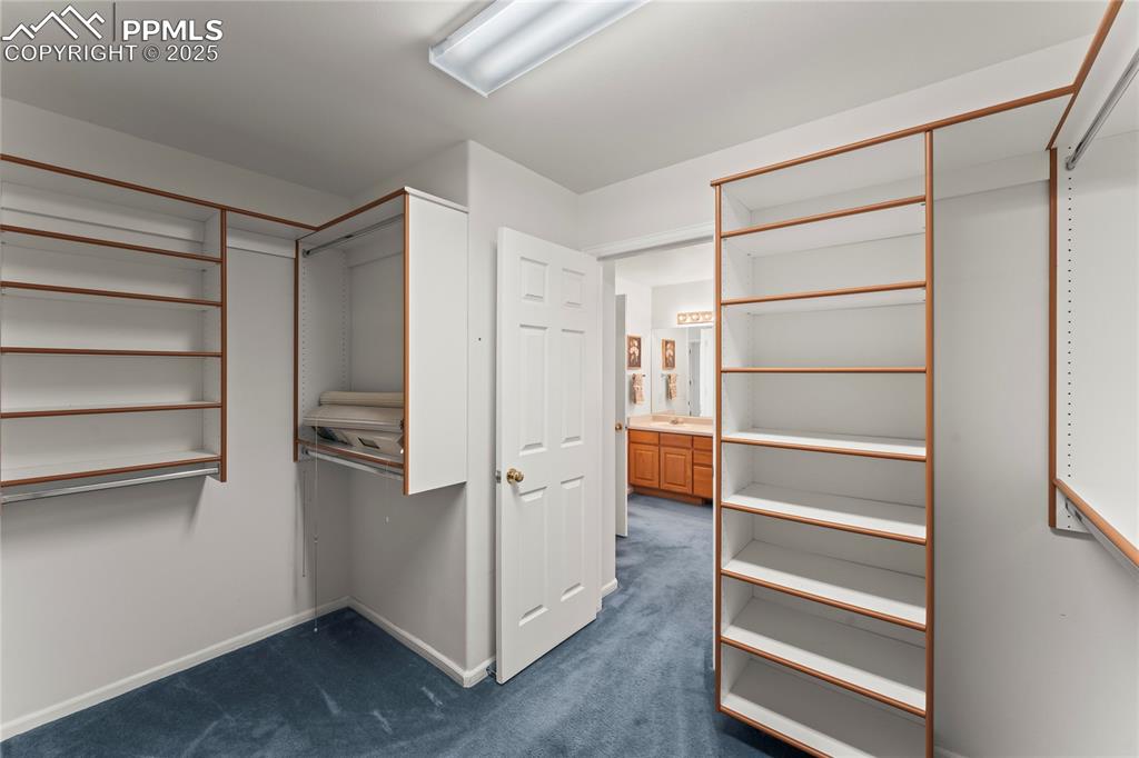 Image 40 of 49: Spacious closet 