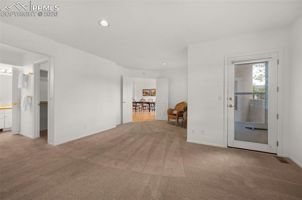 Image 22 of 50: Main Level Primary Bedroom