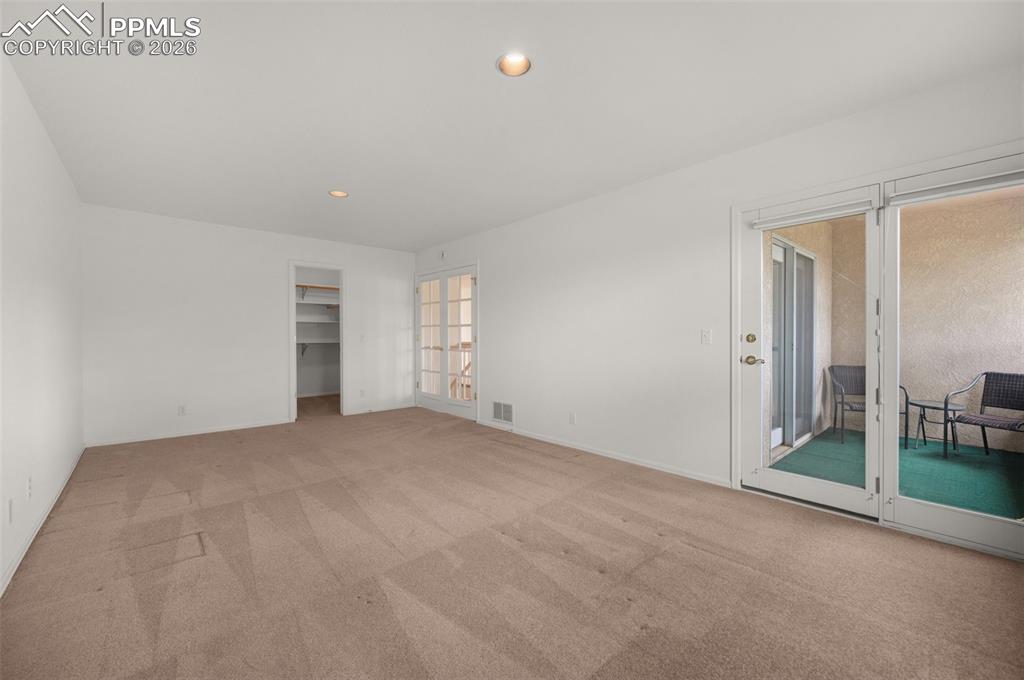 Image 30 of 50: Upper level Office/Bedroom with a Balcony