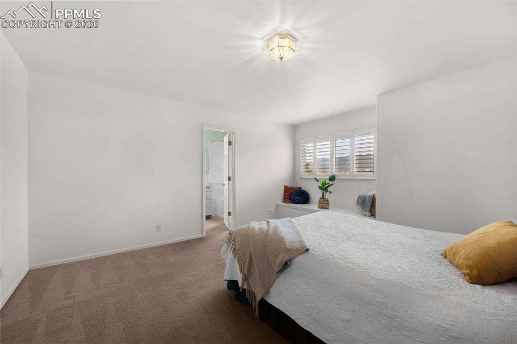 Image 33 of 50: Upper Level Primary Bedroom