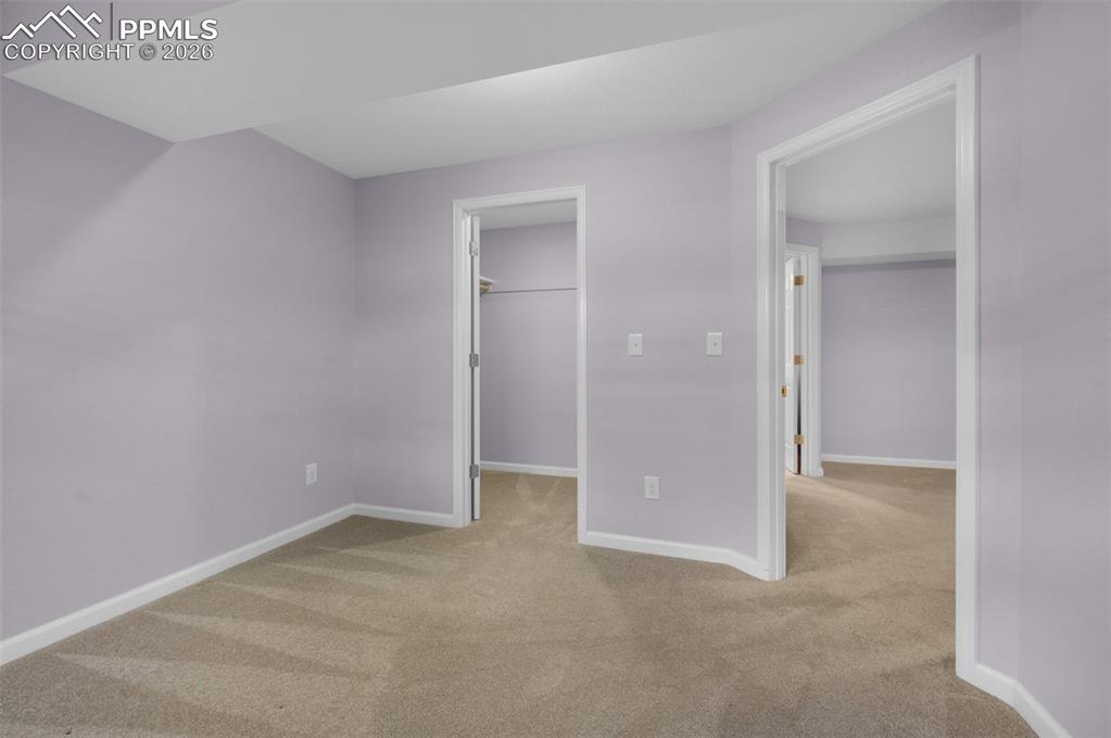 Image 45 of 50: Basement Bedroom