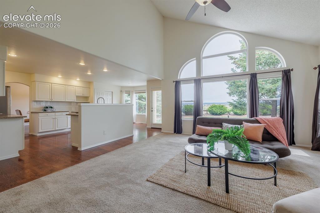 Image 13 of 41: Floor to ceiling windows bring the outside in. Walk out to patio, yard and