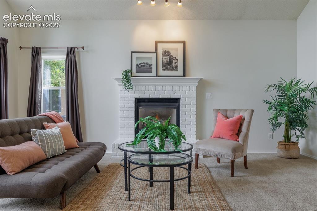 Image 15 of 41: Central entertaining and family space: dining, kitchen, family room and pat