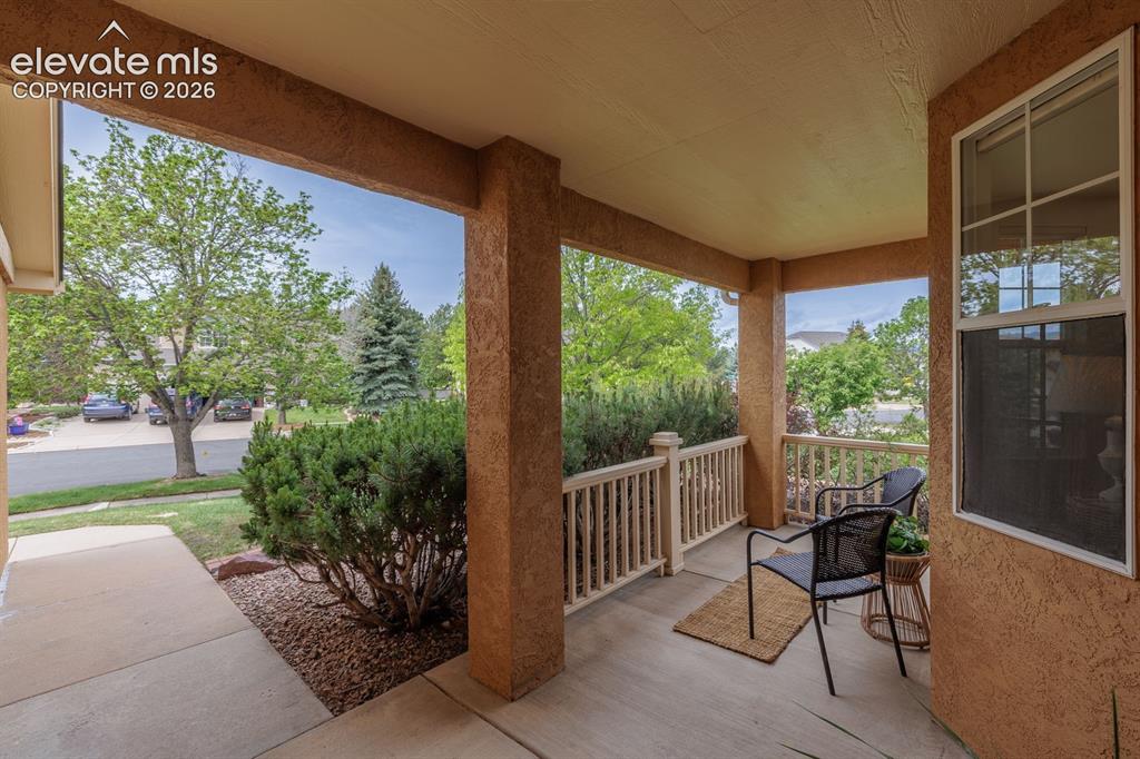 Image 2 of 41: Covered private entry porch