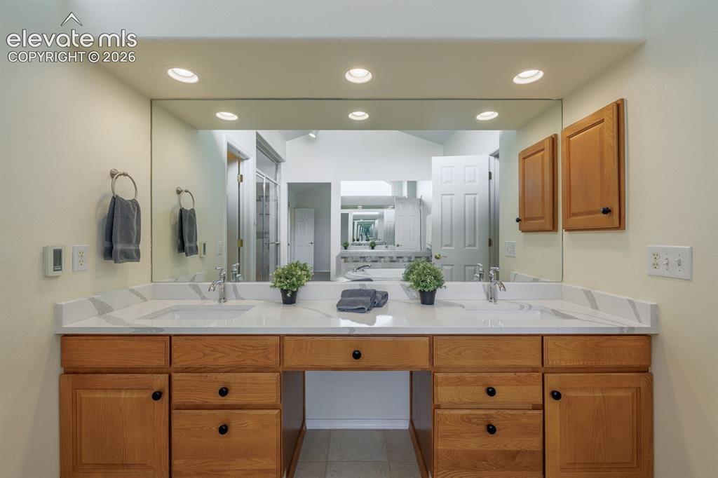 Image 23 of 41: Custom tiled heated floors