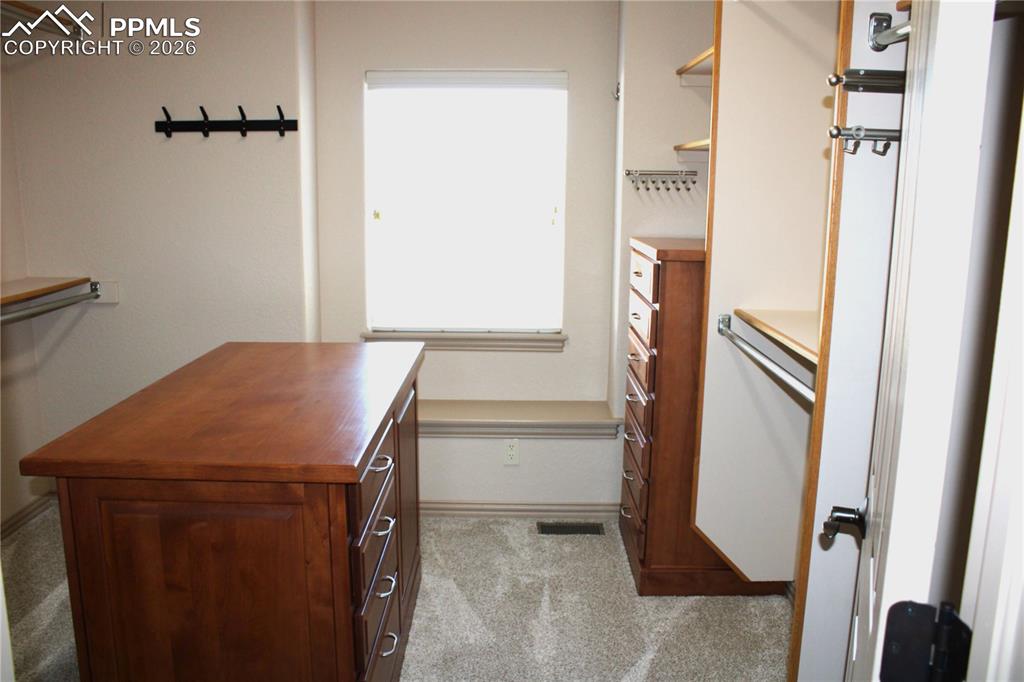 Image 24 of 49: Walk-In Closets