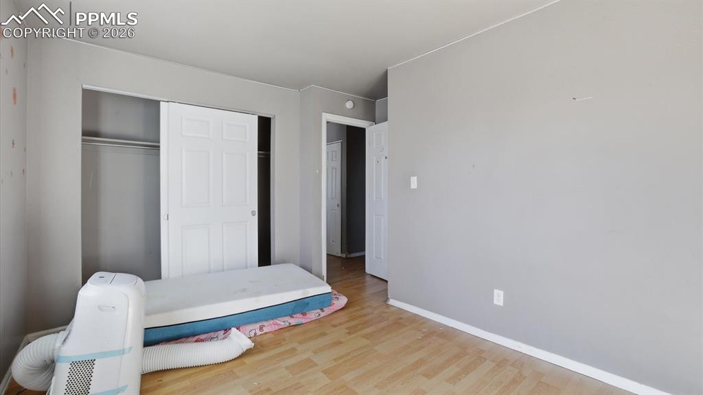 Image 13 of 30: Closet in the upper level Primary Bedroom.