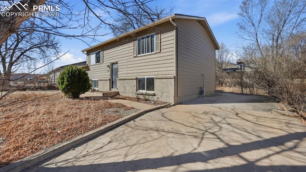 Image 2 of 30: Extra driveway for RV or small boat parking.