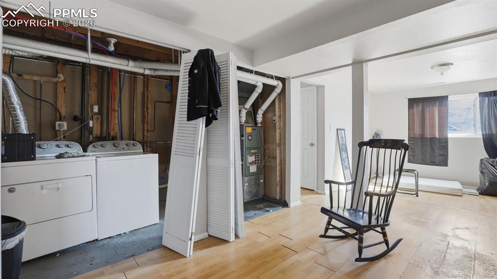 Image 24 of 30: Laundry Area with washer and dryer that stay.