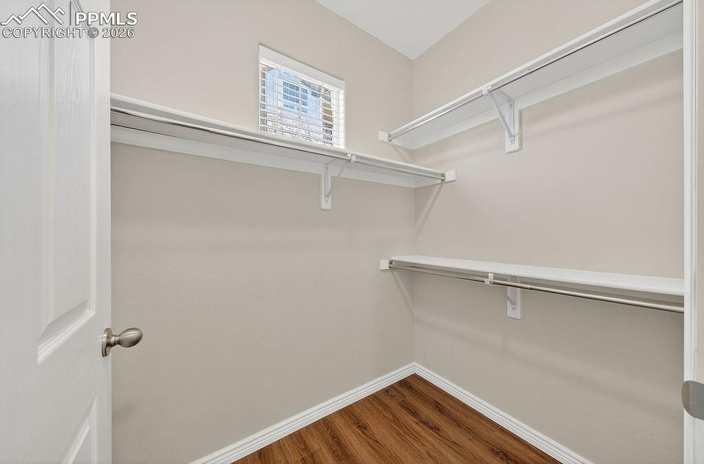 Image 15 of 26: Primary bedroom walk-in closet