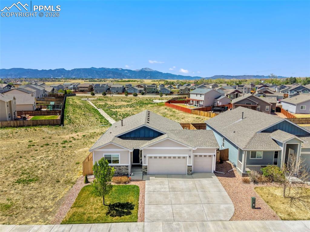 Image 3 of 28: This meticulously cared-for home backs to open space, providing breathtakin