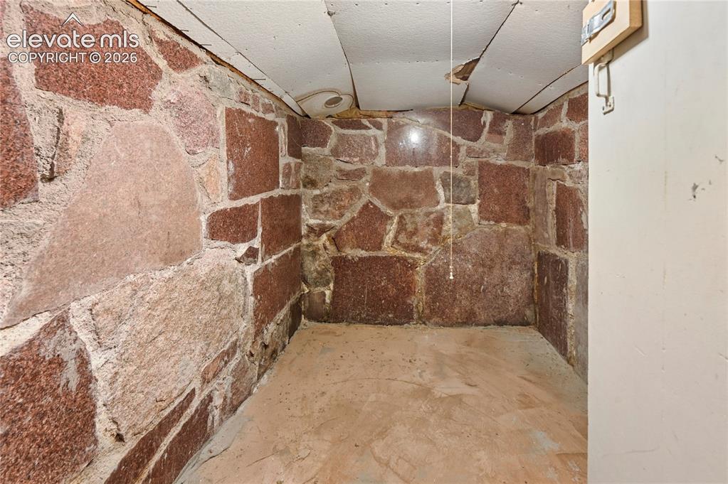 Image 33 of 45: Bonus wine cellar or storage space in the basement