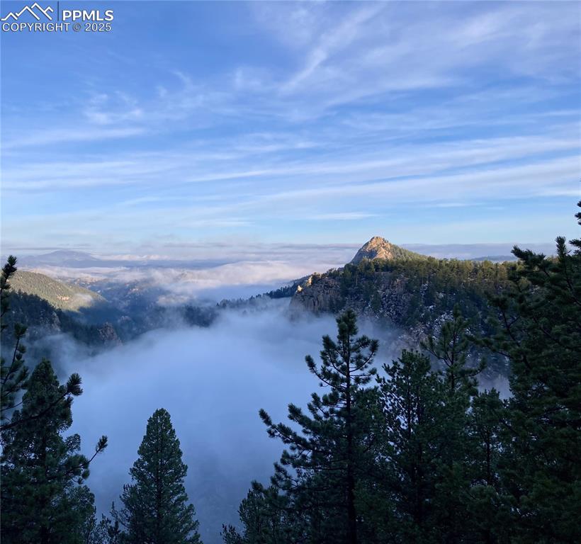 Image 27 of 39: Home Above the Clouds