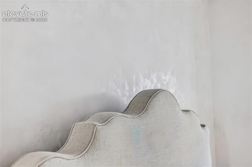 Image 28 of 46: Venetian plaster walling through majority of home