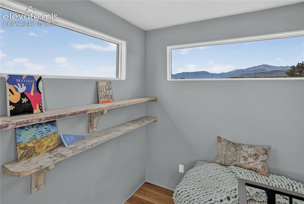 Image 31 of 46: Pikes Peak views from library loft