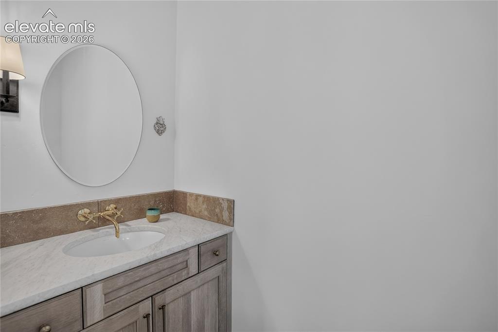 Image 42 of 46: Dedicated powder room for art studio