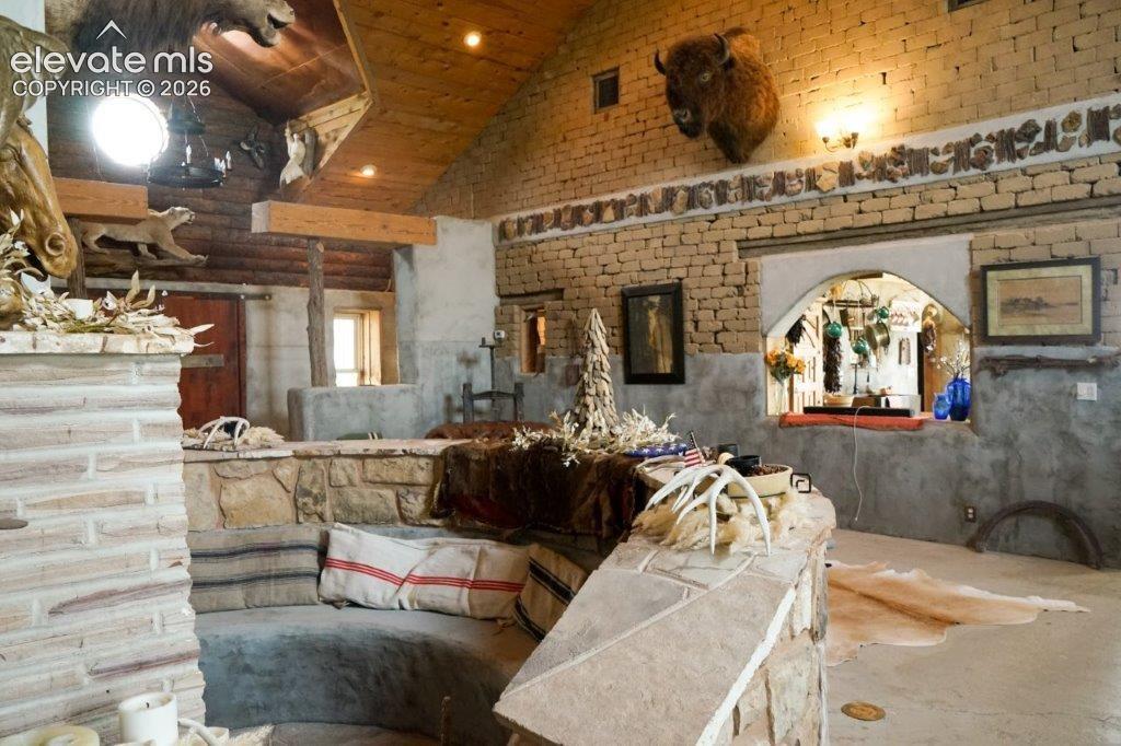 Image 19 of 50: Living Room/Great Room with architectural interior featuring, the sunken st