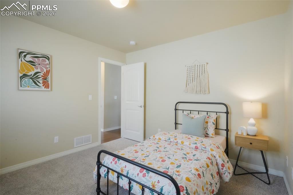 Image 23 of 50: Bedroom