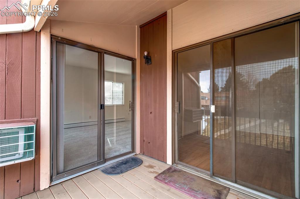 Image 20 of 24: the deck has two sliding glass doors