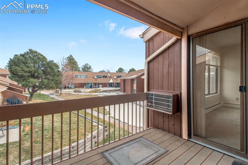 Image 22 of 24: looking out at the common area of the complex