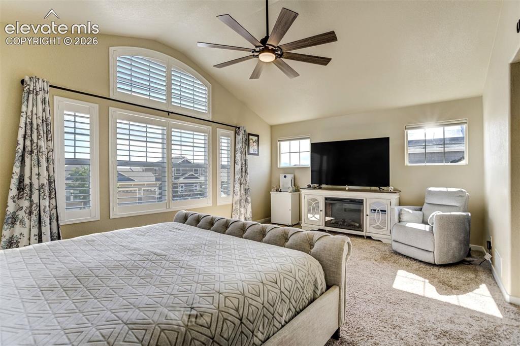 Image 13 of 42: Large bright Primary Bedroom, with sitting area.