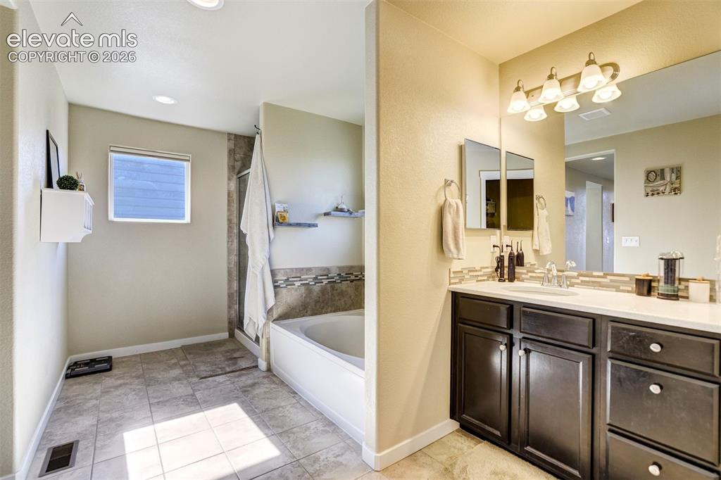 Image 16 of 42: Large luxury in the Primary bath.