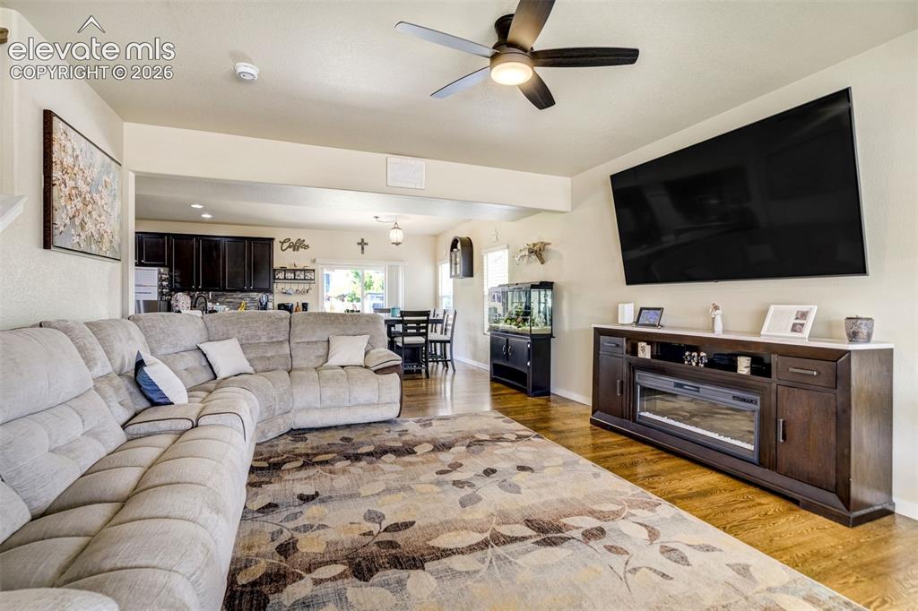 Image 7 of 42: Open to DR and Kitchen.