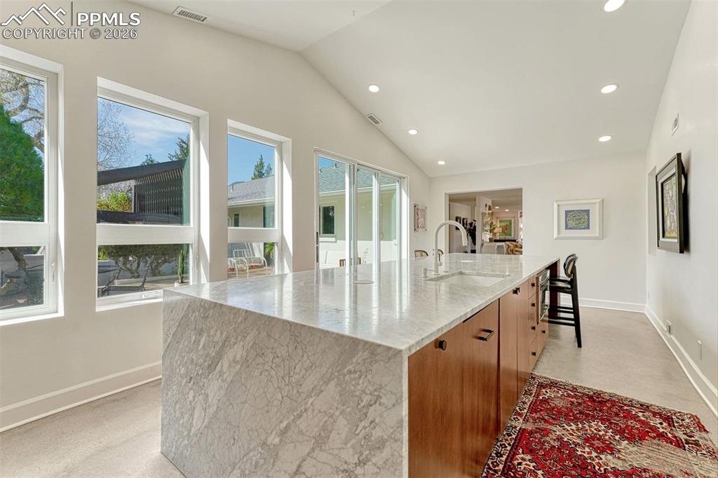 Image 16 of 50: 5x15 island with walk out to patio