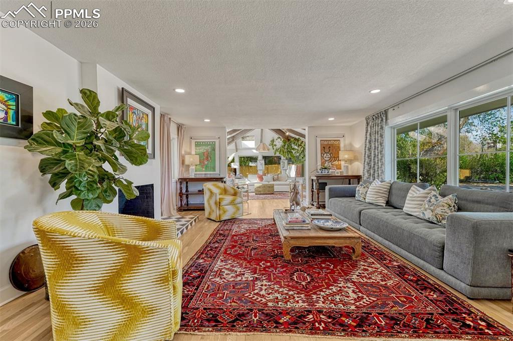 Image 2 of 50: Stunning living room with new white oak floors