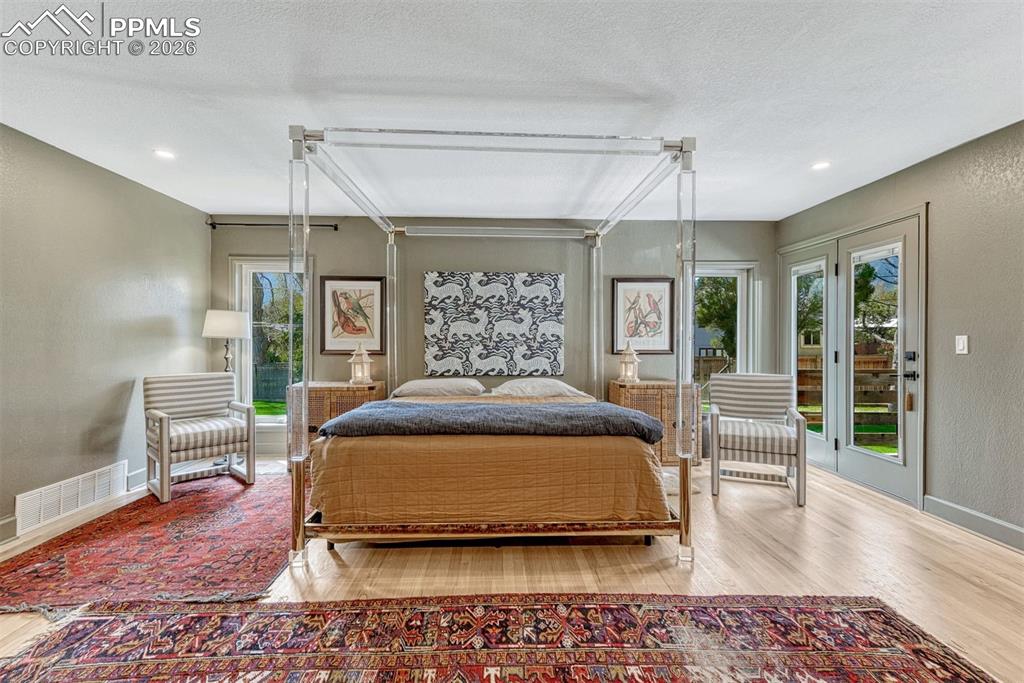 Image 32 of 50: An extensively renovated primary retreat, blending modern design with comfo