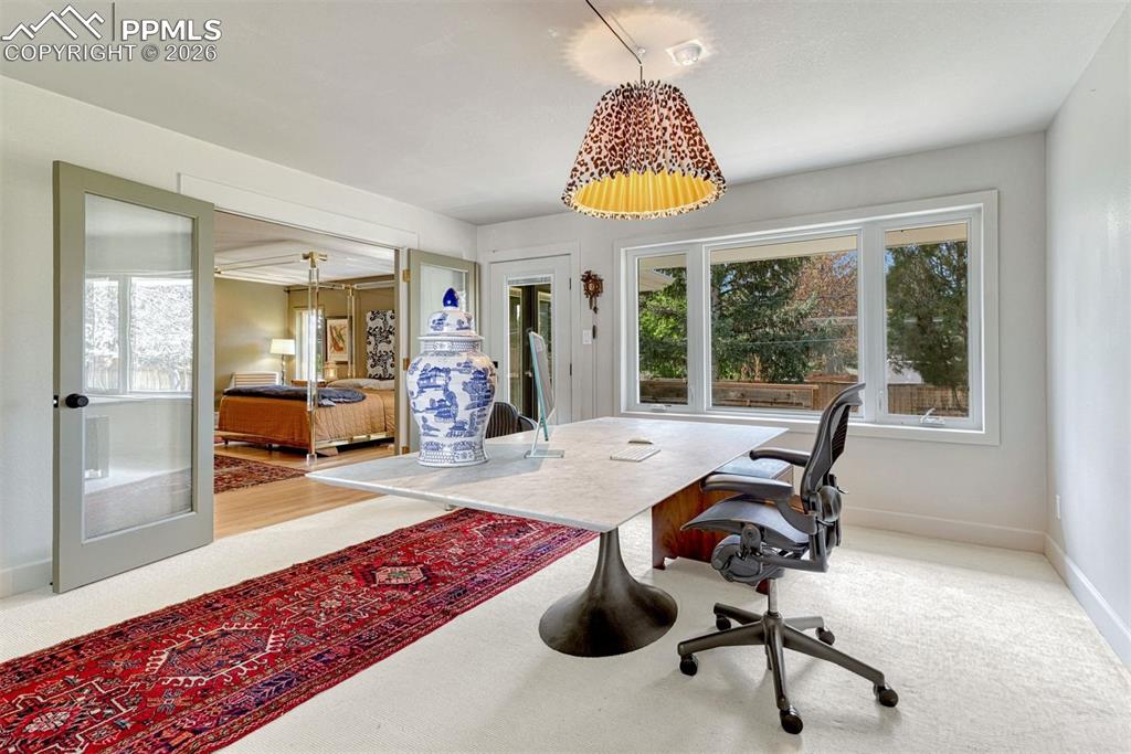 Image 36 of 50: An extensively renovated office retreat, blending modern design with comfor