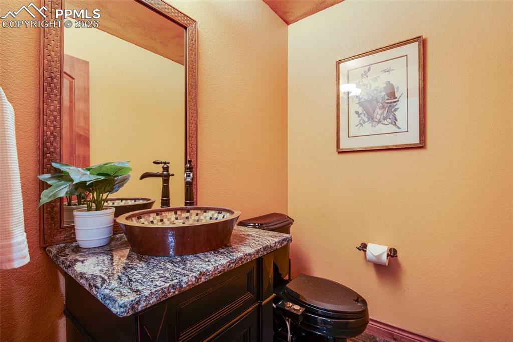 Image 19 of 42: Powder bath on main level