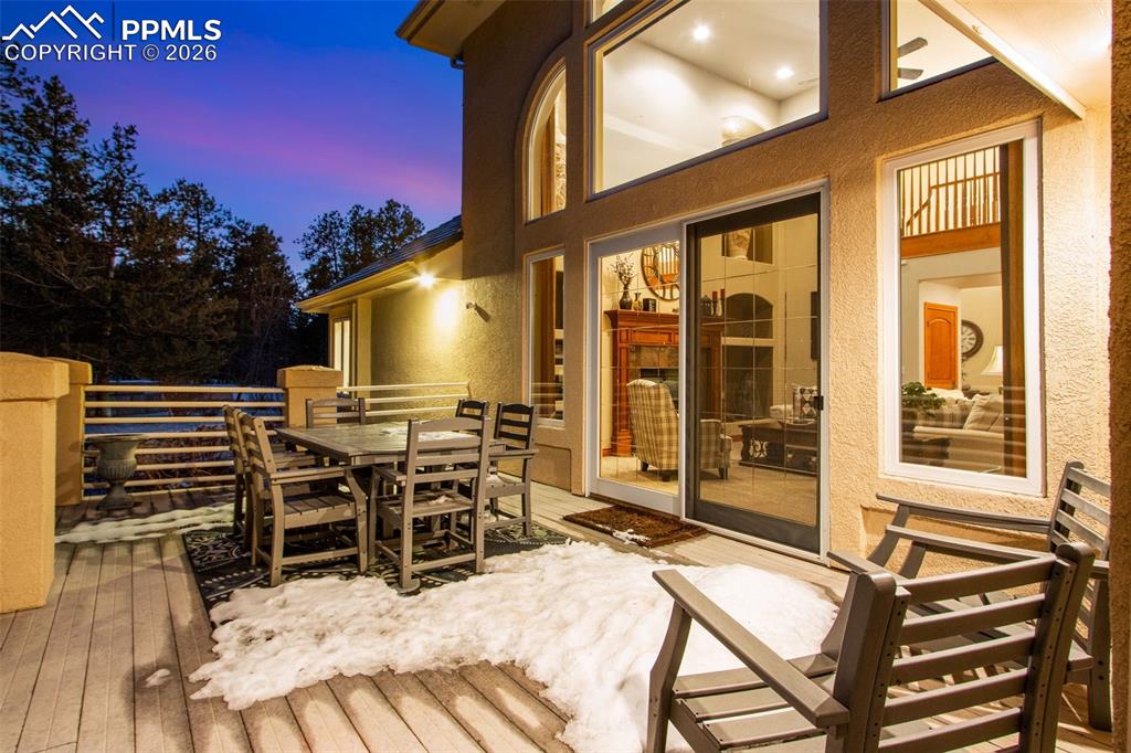 Image 6 of 42: Composite back deck off of the living room