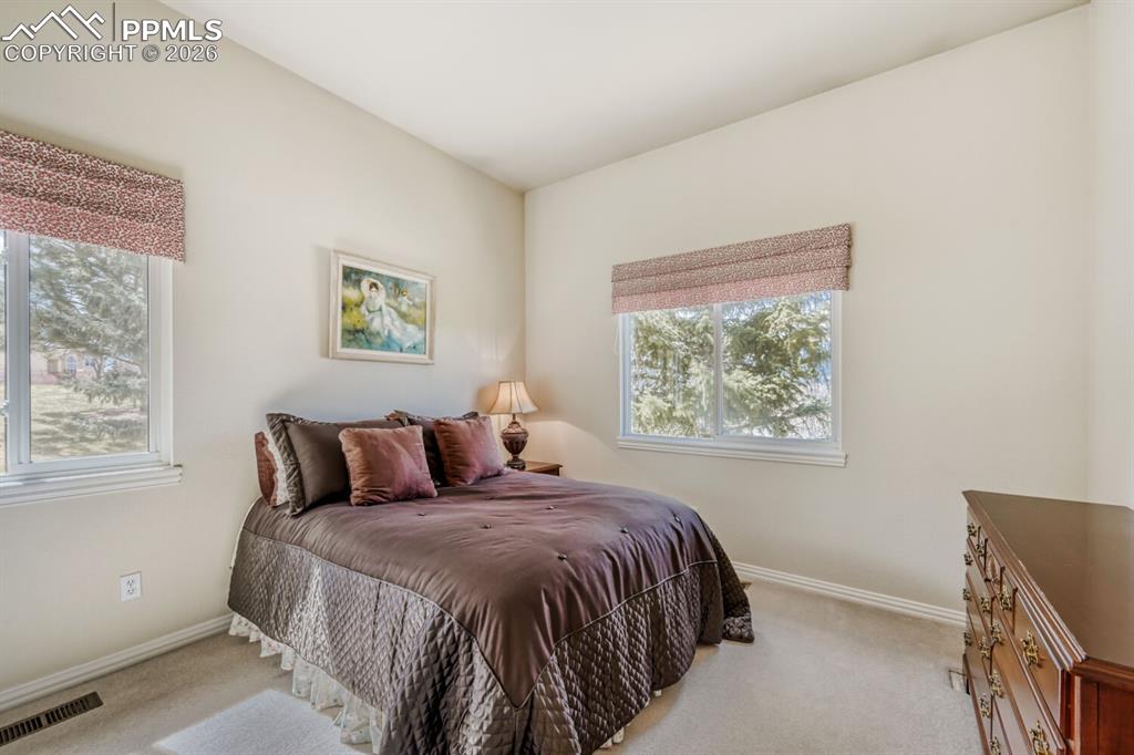 Image 21 of 48: Second main level bedroom