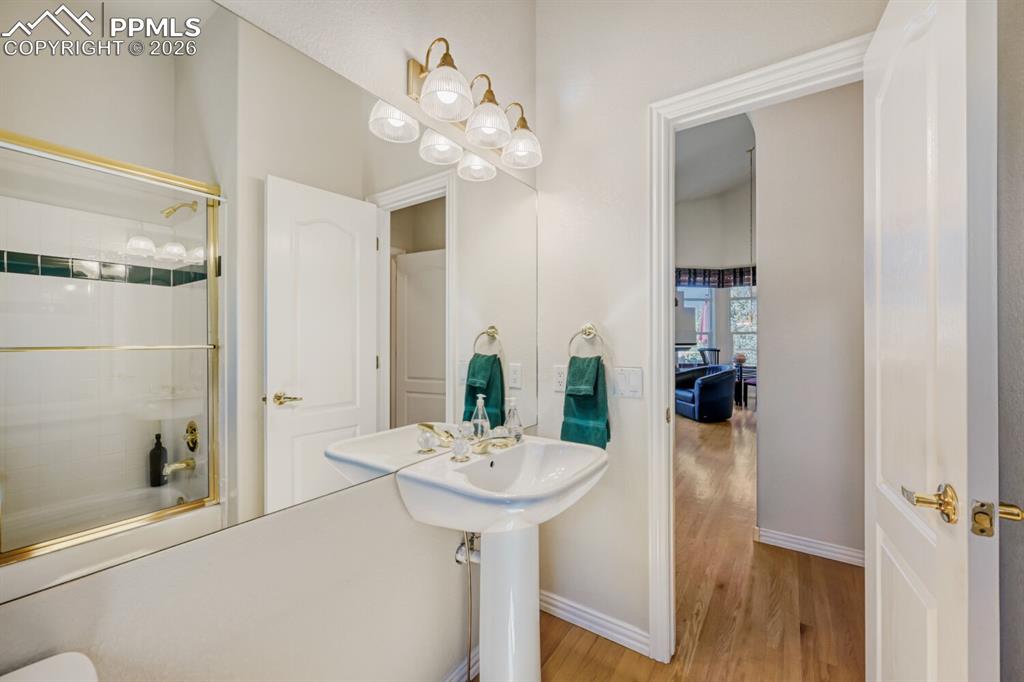 Image 22 of 48: Main level full bath.