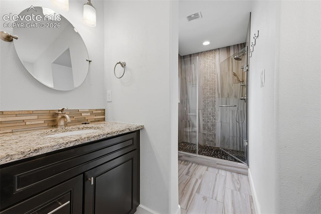 Image 14 of 50: Master Bathroom