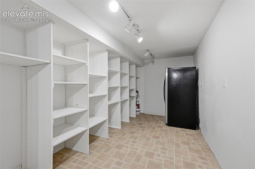 Image 43 of 50: Storage Room & Laundry Area 