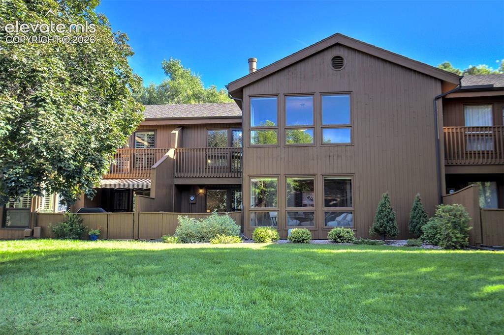 Image 2 of 50: Larger patio and Patio to enjoy the Colorado seasons