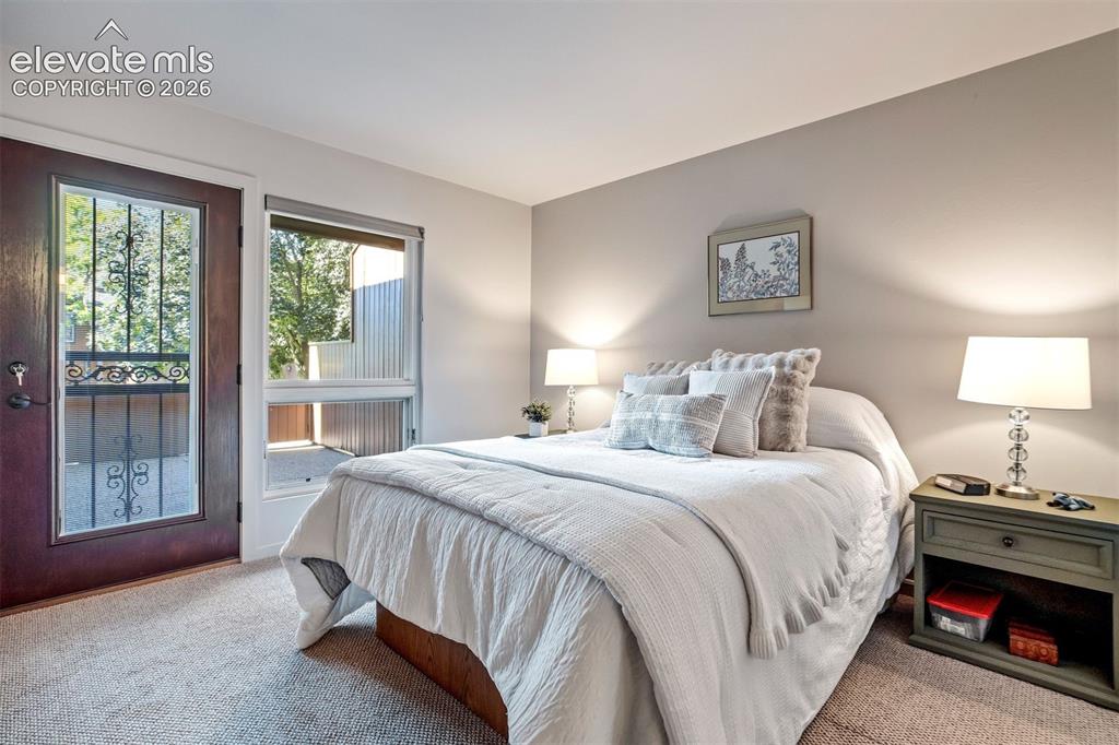 Image 23 of 50: A main-level primary suite provides convenient one-level living.
