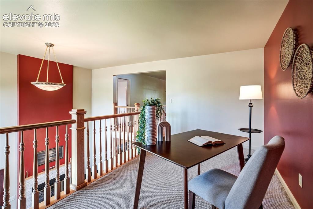 Image 30 of 50: The spacious loft/study overlooks the living area & provides an ideal home 