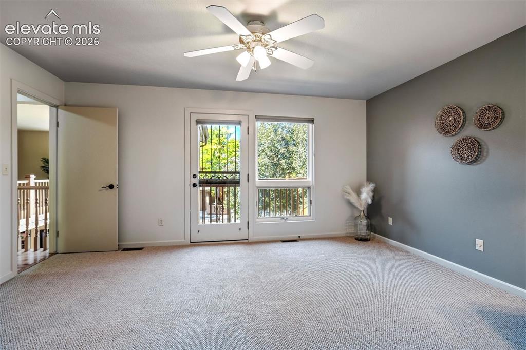Image 33 of 50: Upper-level Jr. suite has a balcony to enjoy the Colorado seasons