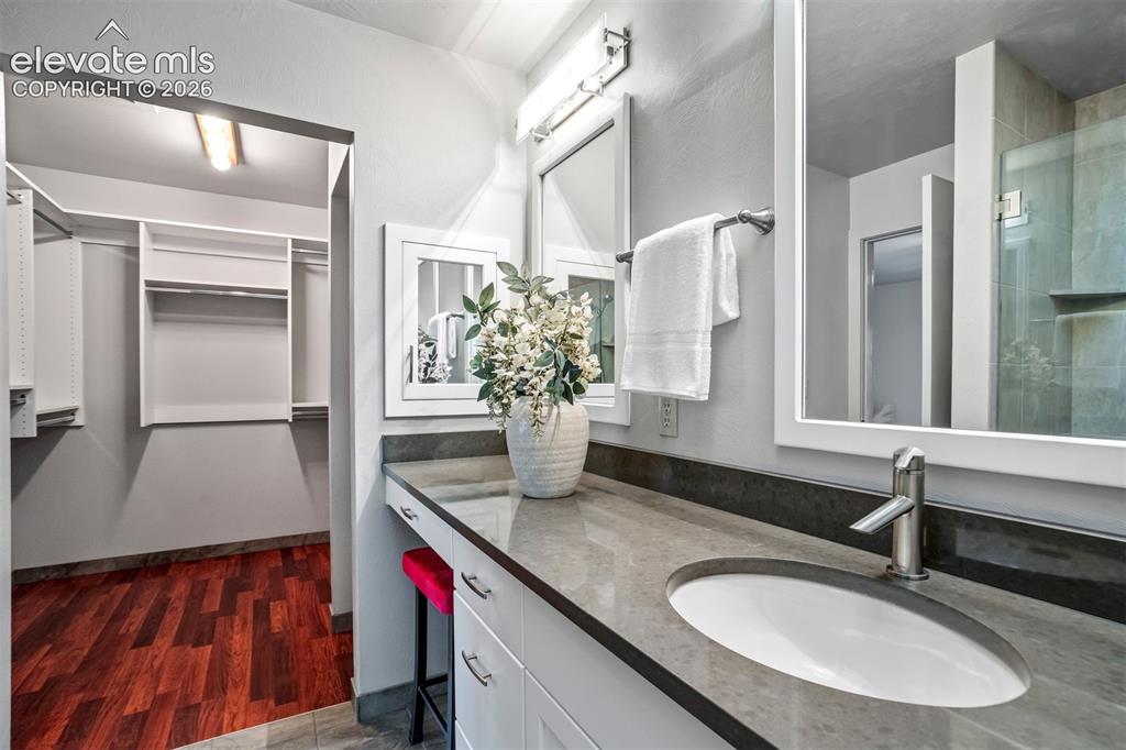 Image 37 of 50: Updated jr. suite bathroom with skylight