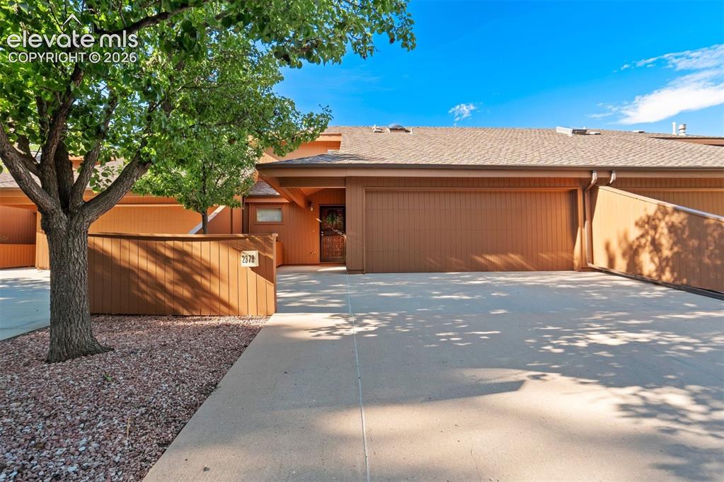 Image 44 of 50: 1 of the few units that has a true driveway