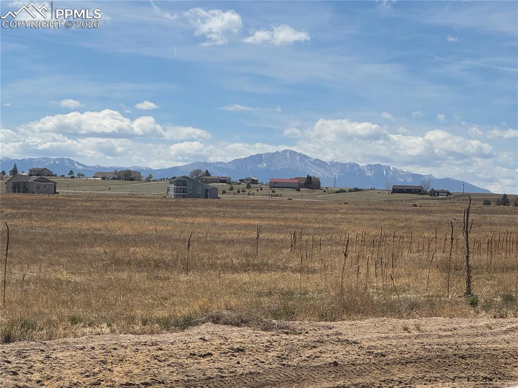 Image 7 of 9: The property offers expansive views of distant mountains with snow-capped p