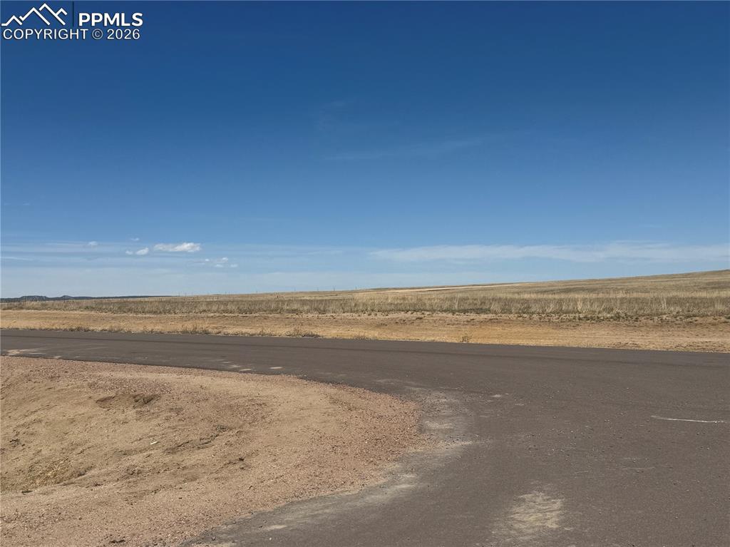 Image 9 of 9: Expansive views of the surrounding natural landscape with a clear, open sky