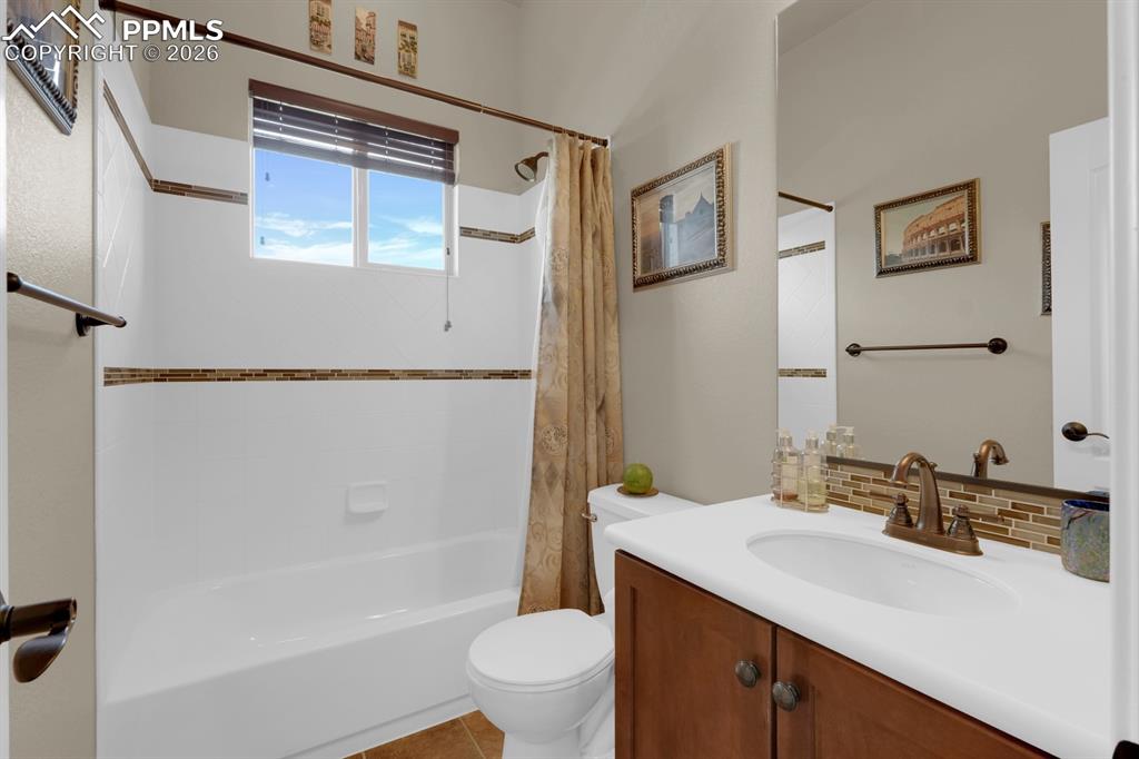 Image 20 of 33: Main level bathroom